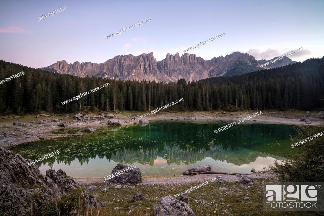 Stock Photo: Latemar mountain range and woods are reflected in Lake Carezza Ega Valley Province of Bolzano South Tyrol Italy Europe.