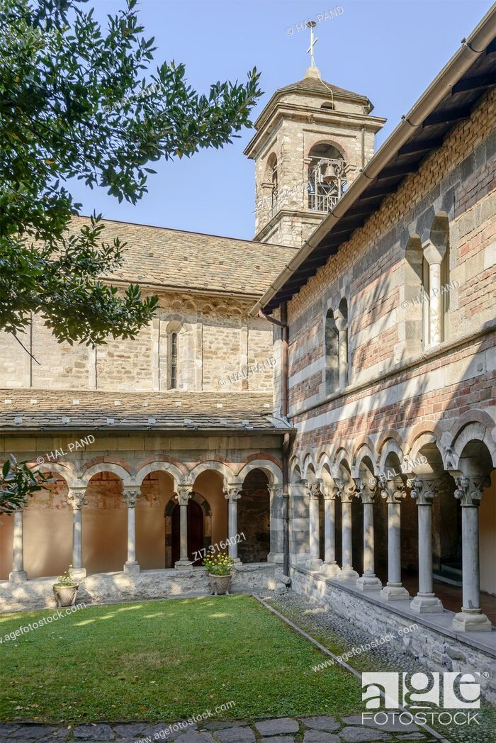 Stock Photo: view of Romanesque cloister and belltower at Abbey on shore of Lario lake, shot in bright fall light at Piona, Lecco, Italy.