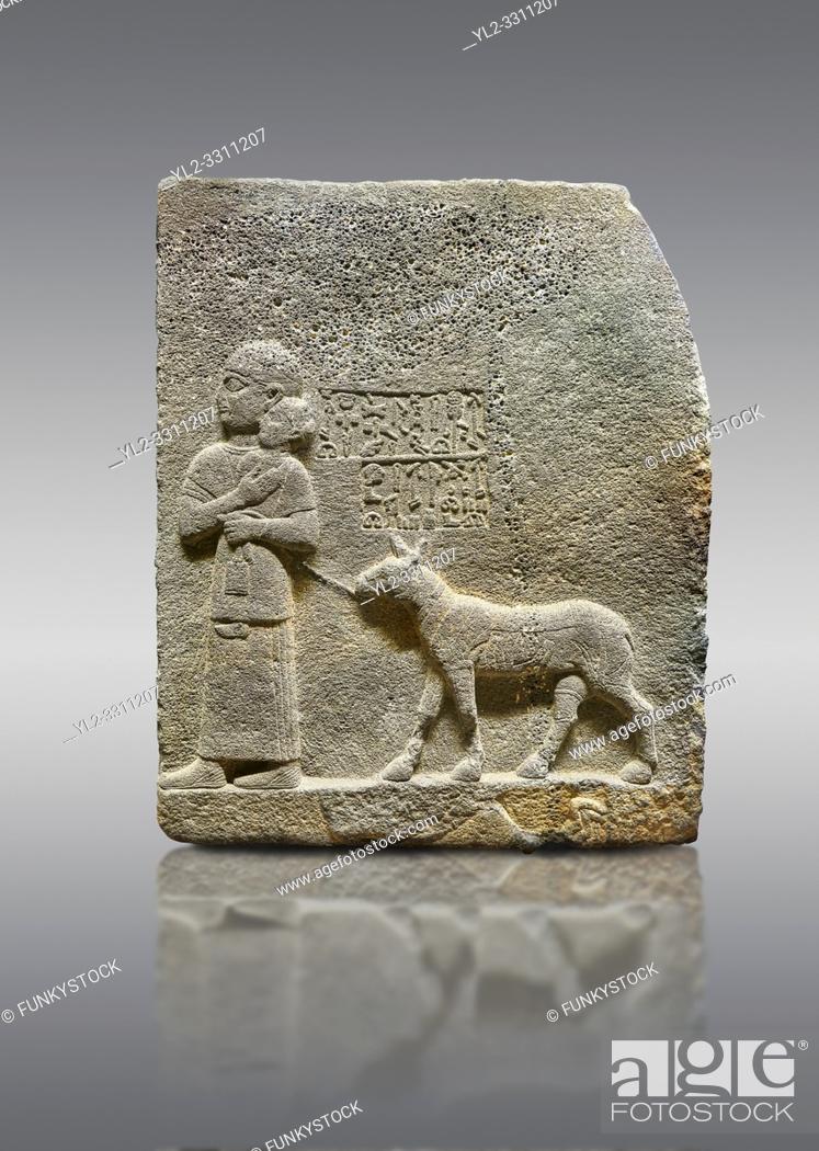 Stock Photo: Picture & image of Hittite monumental relief sculpted orthostat stone panel of Royal Buttress. Basalt, KarkamÄ±s, (KargamÄ±s), Carchemish (Karkemish), 900-700 B.