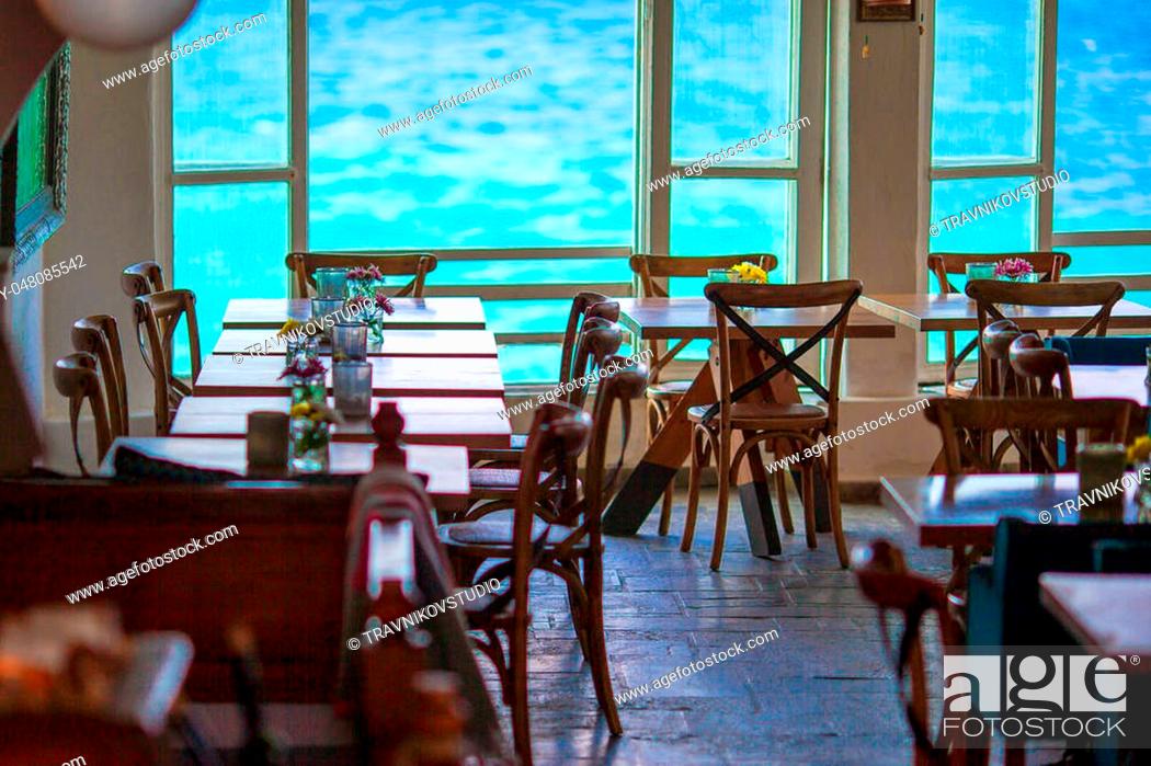 Stock Photo: Summer empty cafe with beautiful view to the sea in popular area in Mykonos Little Venice.