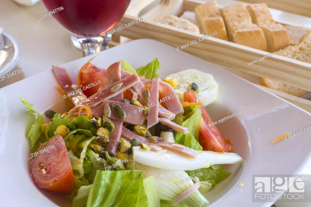 Stock Photo: Vegetable tasty salad with ham and nuts Spain.