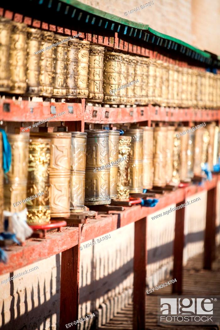 Stock Photo: Spinning Buddhist prayer drums at a monastery in Mongolia.