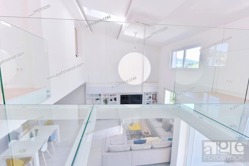 Stock Photo: interior of a luxury stylish modern open space design two level apartment with white walls.