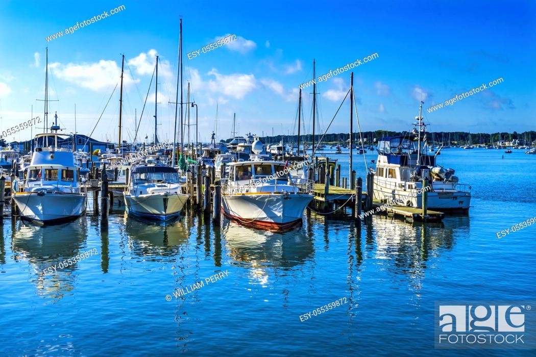 Stock Photo: Motor Boats Padanaram Harbor Sailboats Buzzards Bay Dartmouth Massachusetts. . .