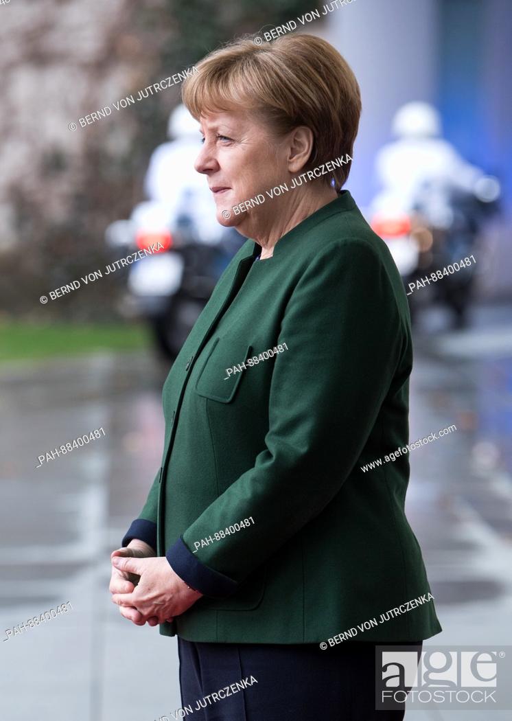 Stock Photo: German Chancellor Angela Merkel (CDU) waits for the arrival of the President of the European Parliament, Antonio Tajani, at the chancellery in Berlin, Germany.