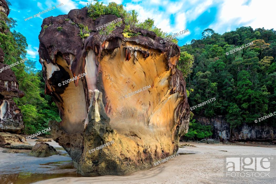 Stock Photo: Geologically interesting sandstone rock formation at Bako National Park on Borneo. The park with its rich biodiversity and multiple biomes is also famous for.