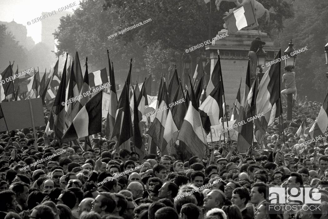 Stock Photo: The risk of a revolution in Paris has been averted. French flags on the Champs-Elysées in a demonstration of De Gaulle supporters.