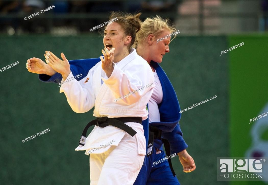 Stock Photo: Germany's Luise Malzahn (blue) competes in the Women's -78kg Final with Marhinde Verkehr of Netherlands at the Baku 2015 European Games in Heydar Aliyev Arena.