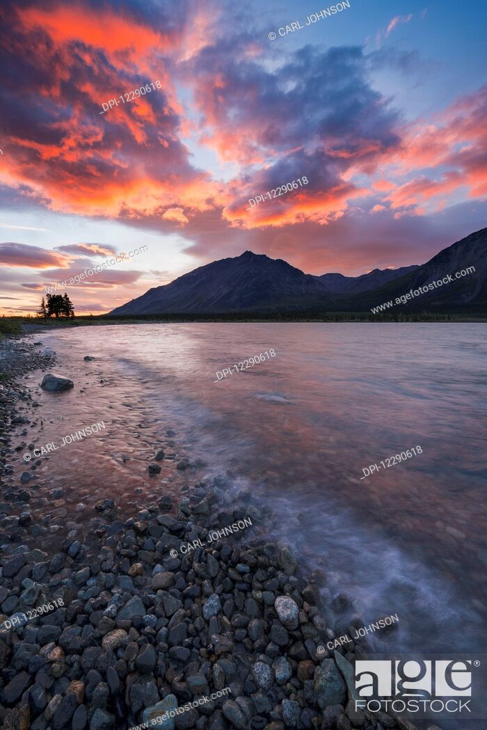 Stock Photo: Colors of sunset fill the sky over upper Twin Lake in Lake Clark National Park & Preserve, Alaska.
