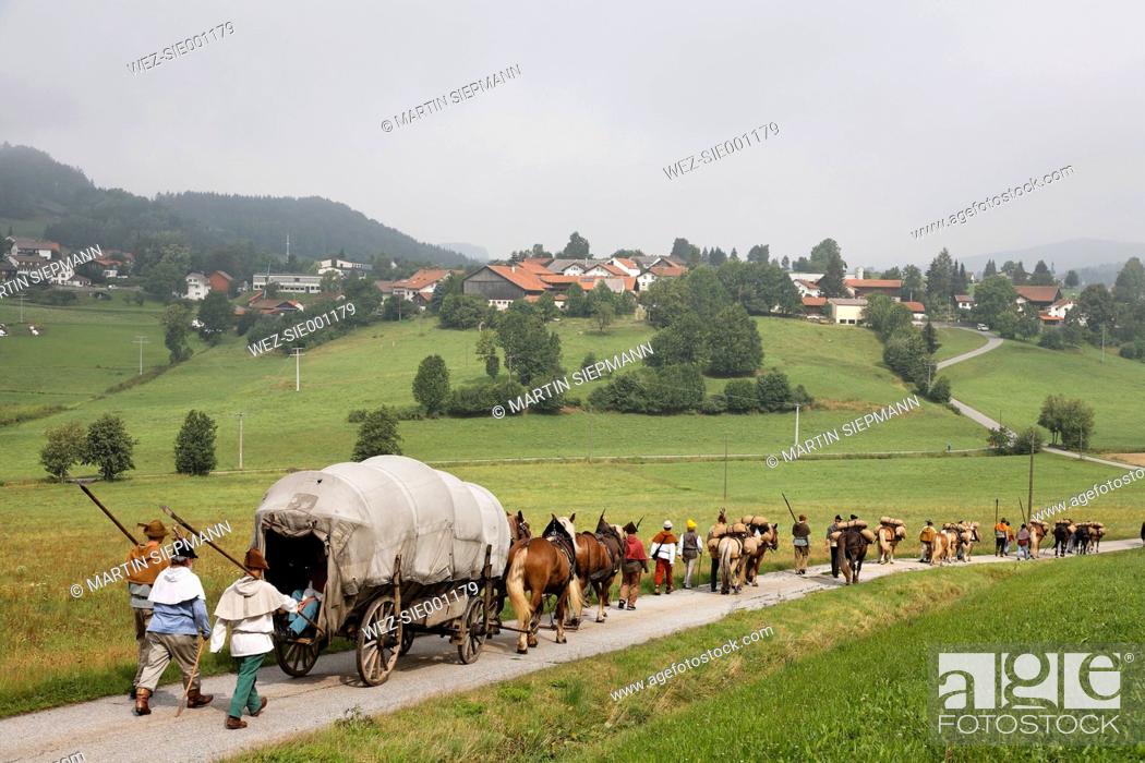 Stock Photo: Germany, Bavaria, Lower Bavaria, People in historical sumpter procession.