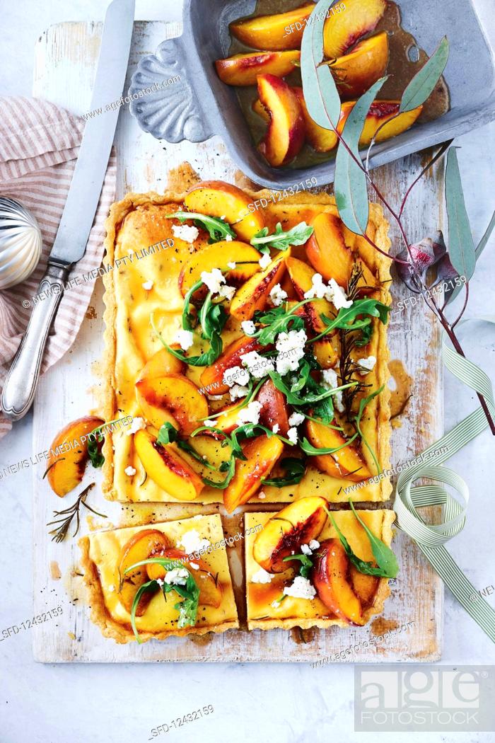 Photo de stock: Goat's cheese and fennel tart with polenta pastry and roasted peaches.