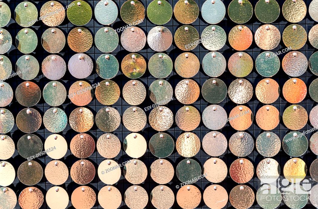 Stock Photo: Background from small round metal plates of golden color.