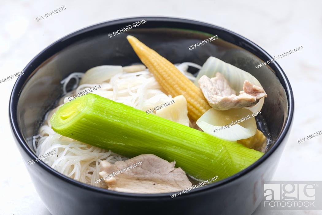 Stock Photo: soup pho with vegetables and rice noodles.