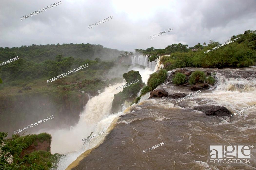 Stock Photo: Iguazu Falls in the Argentine side. Iguazu Falls are waterfalls of Iguazu River on the border of the Argentine province of Misiones and the Brasilian state of.