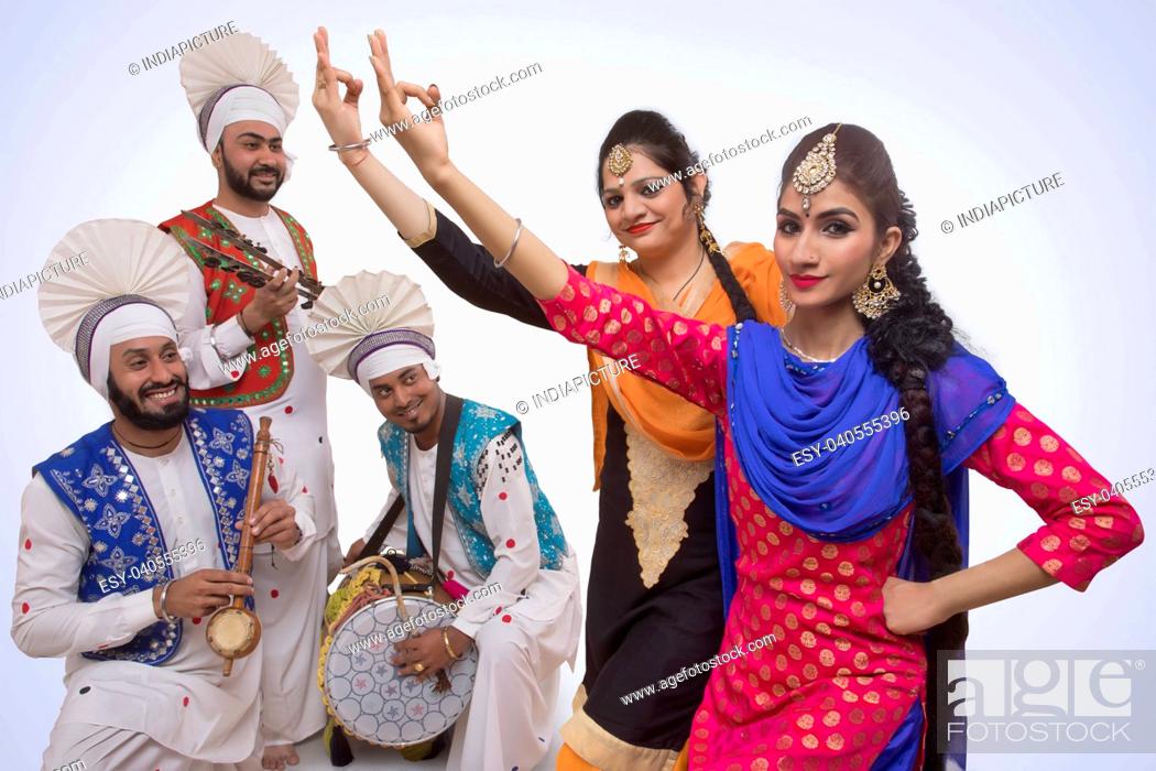Stock Photo: Sikh People Dancing.