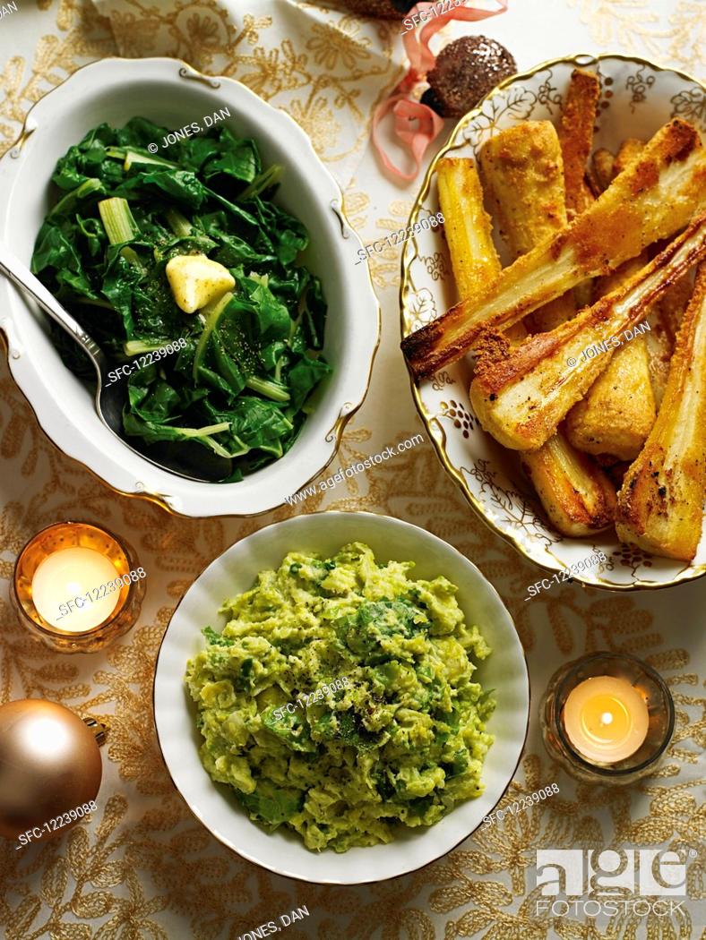 Stock Photo: Christmas side dishes: Brussels sprout mash, chard and parsnips with cheese.