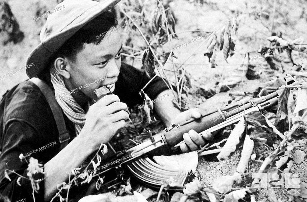 Stock Photo: Vietnam: NLF (Viet Cong) soldier with AK47 assault rifle near Saigon, 1968.