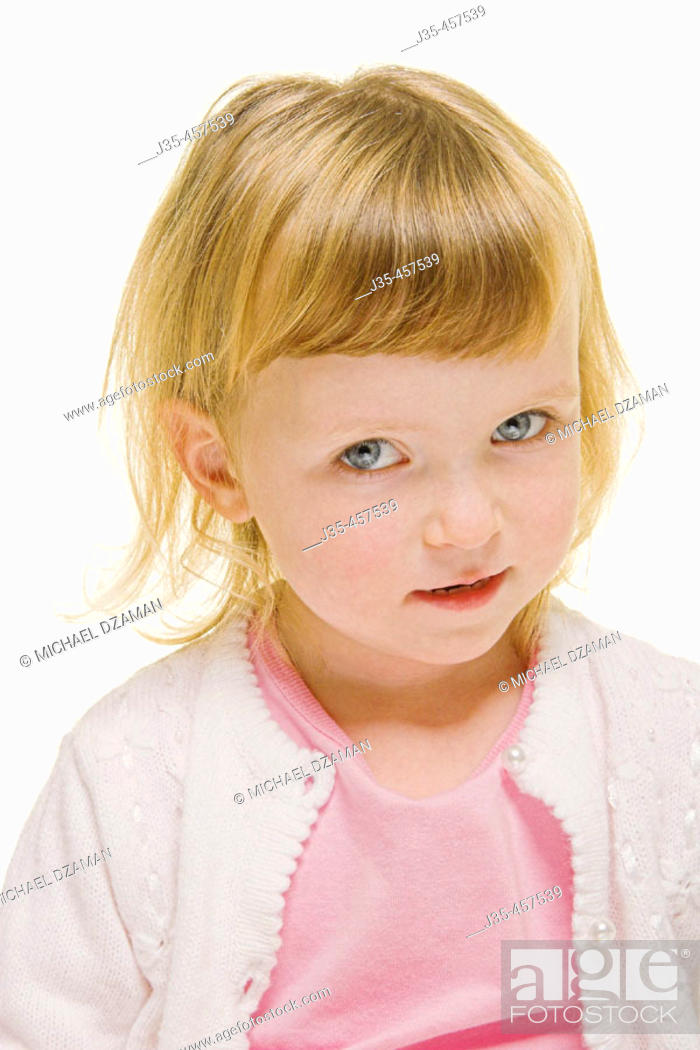 A three year old girl with blonde hair wearing a white sweater and a pink  top looks into camera with..., Stock Photo, Picture And Rights Managed  Image. Pic. J35-457539 | agefotostock