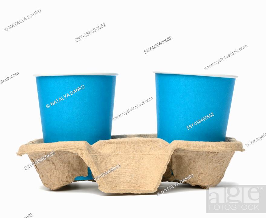 Stock Photo: two blue paper disposable cups stand in the tray, white background, takeaway containers.