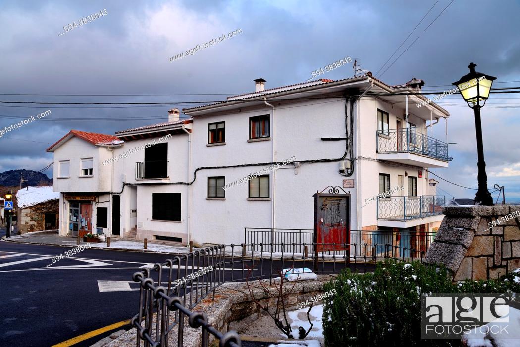 Stock Photo: Buildings in the crossroads between Real and Mayor streets, Bustarviejo, Madrid, Spain.