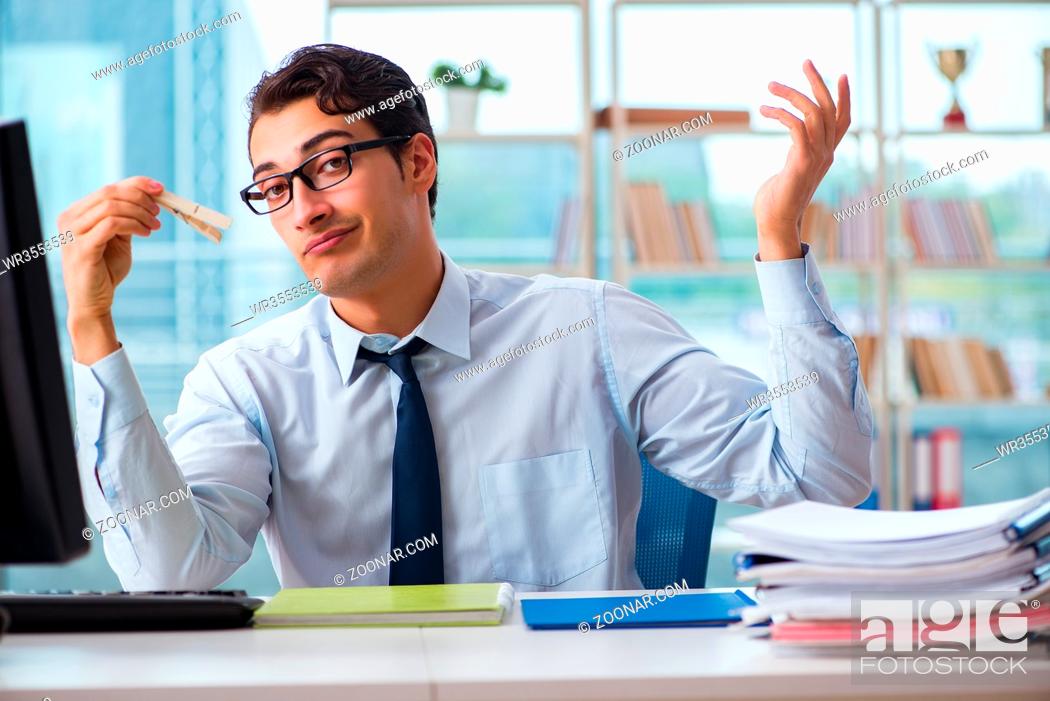 Stock Photo: Businessman suffering from excessive armpit sweating.