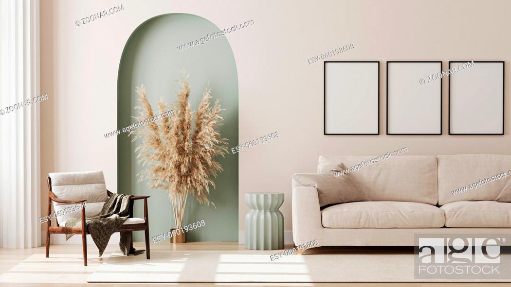 Stock Photo: empty poster frame on beige wall in living room interior with modern furniture and decorative green arch with trendy dried flowers, white sofa and armchair.