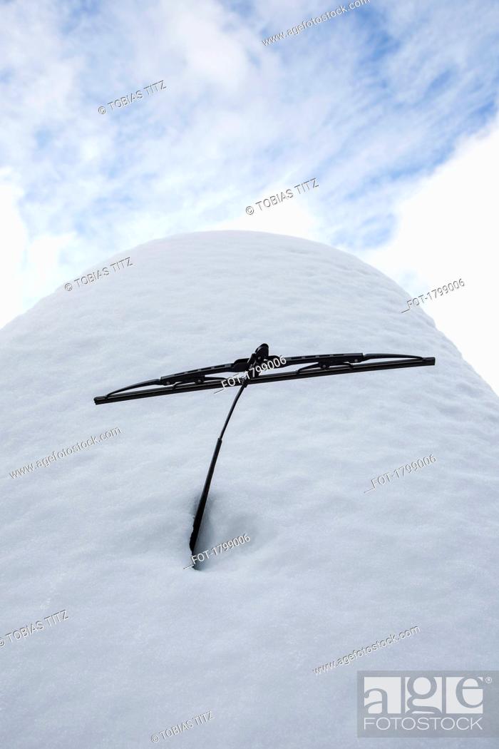 Stock Photo: Snow mound covering parked car.