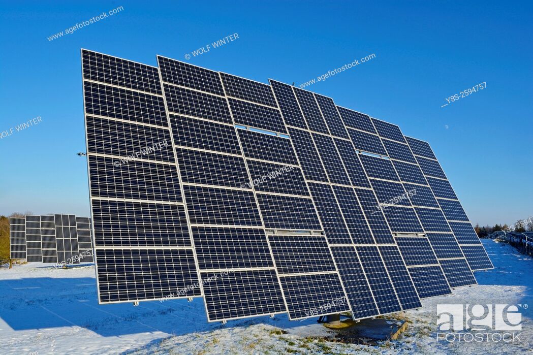 Stock Photo: Solarpark Mengeringhausen with static Modules and Modules, that follow the Azimuth of the Sun. Bad Arolsen, Hesse, Germany.