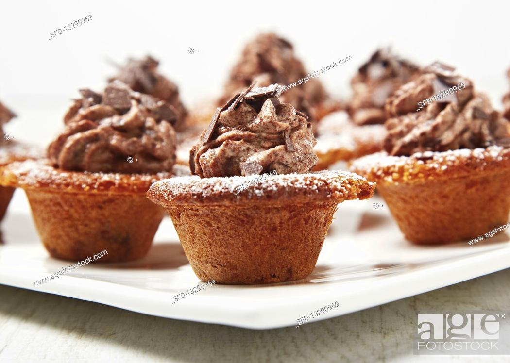 Stock Photo: Cherry muffins with chocolate cream.