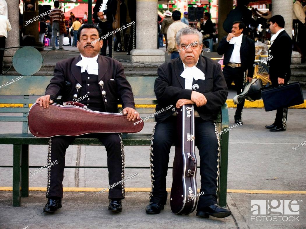 Stock Photo: Old musicians waiting for a job. Mariachis in Plaza Garibaldi, Mexico.