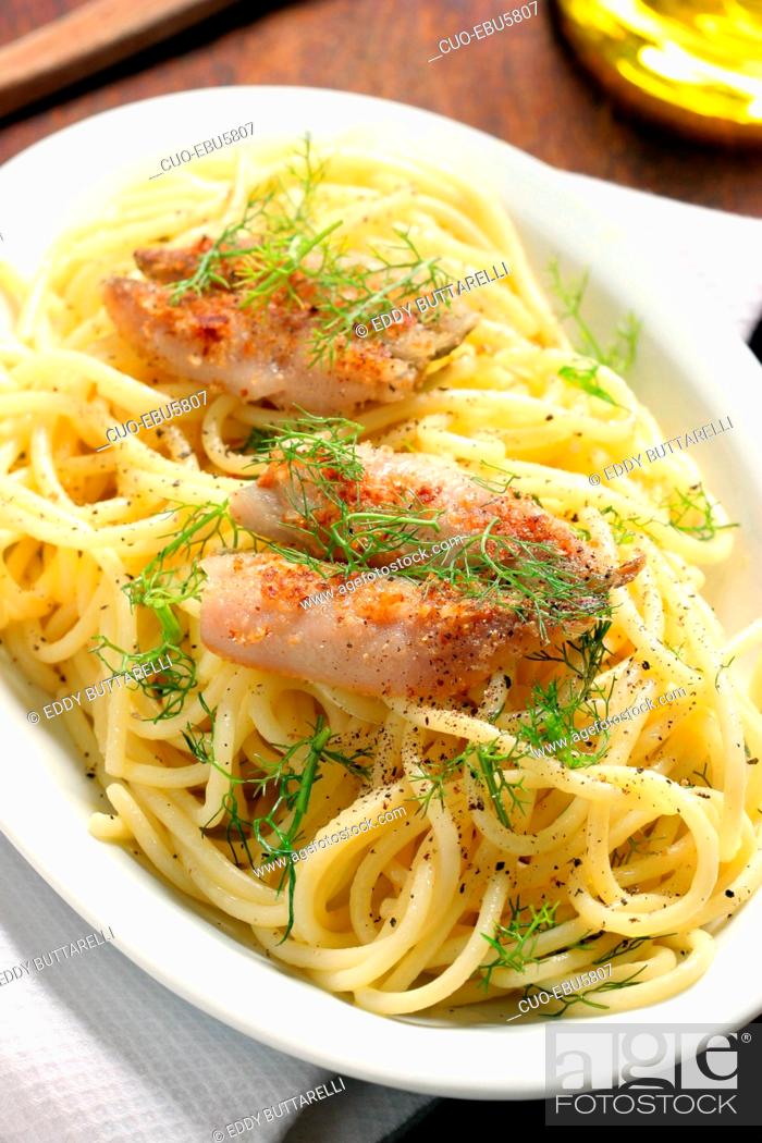 Stock Photo: Spaghetti pasta with wild fennel and squid, Apulia, Italy.