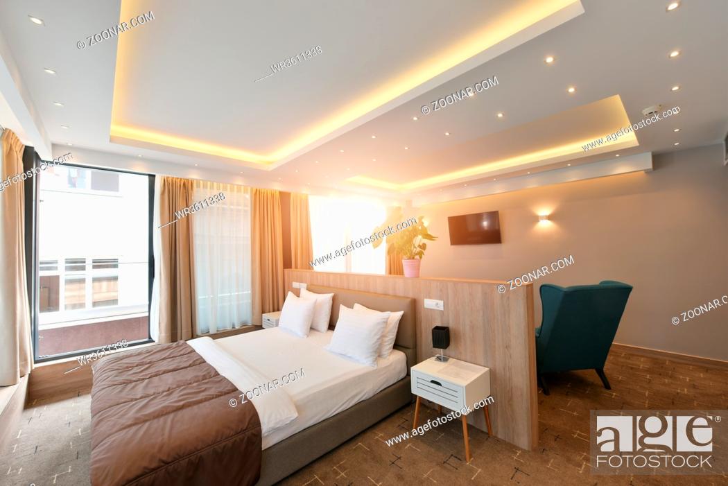 Stock Photo: hotel room in modern architecture style comfortable bed in and luxury decorations.