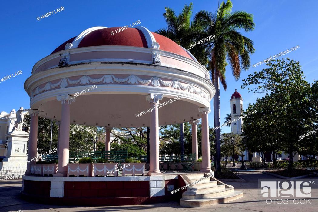 Stock Photo: Pavilion in the park, Parque Jose Marti, in background the cathedral, Catedral de la Purisima Concepcion, Cienfuegos, Cienfuegos Province, Cuba.