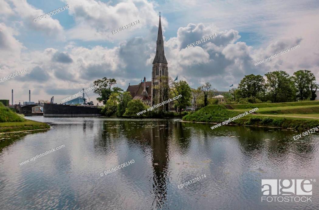 Stock Photo: A picture of St. Alban's Church across the water body that surrounds the Kastellet, in Copenhagen.