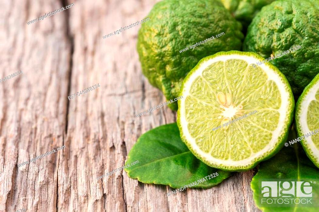 Close Up Slice Green Fresh Bergamot Fruit On Wooden Table Background Stock Photo Picture And Low Budget Royalty Free Image Pic Esy 046288334 Agefotostock