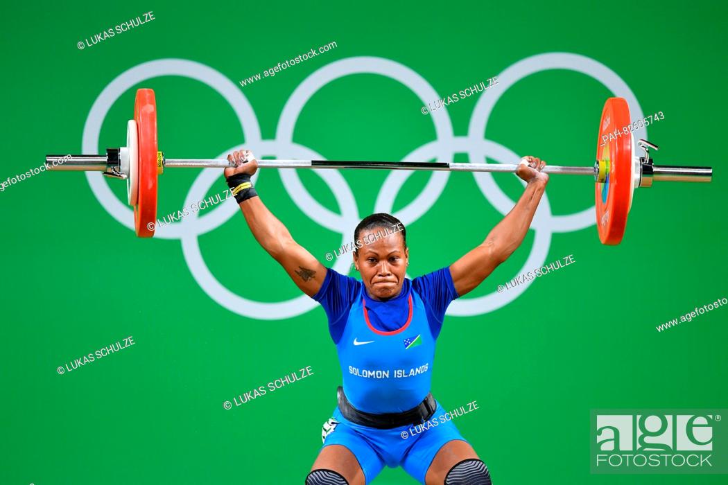 Stock Photo: Jenly Wini of the Solomon Islands competes during the Women's 58kg Group B category of the Rio 2016 Olympic Games Weightlifting events at the Riocentro in Rio.