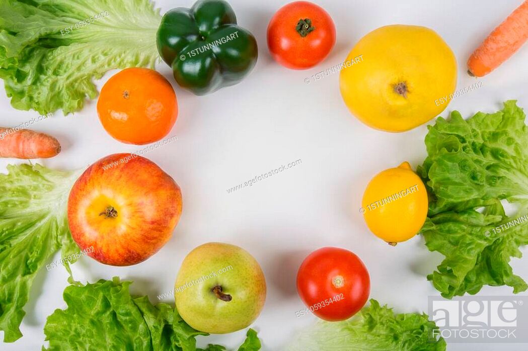 Stock Photo: Healthy bio food arranged in circle on the table with copy space in the middle. Organic fruits and vegetables from farm garden.