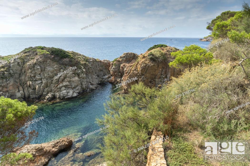 Stock Photo: Sant Feliu de Guixols at Costa Brava in Catalonia, Mediterranean Sea, Spain on September 2020. The Camino de Ronda goes all the way from S'Agaro to Playa d'Aro.