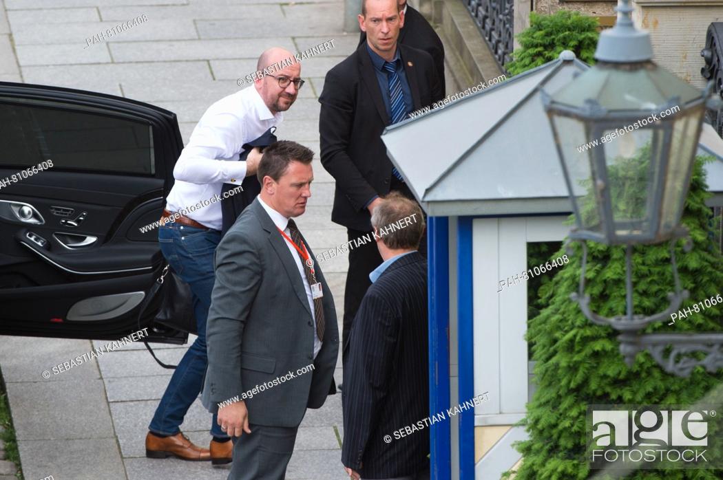Stock Photo: Belgian Prime Minister Charles Michel (L) arrives to the Bilderberg Conference in front of the Kempinski Hotel Taschenbergpalais in Dresden,  Germany.