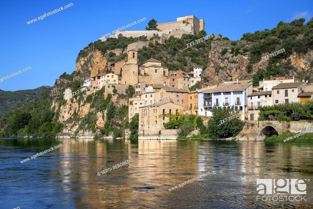 Stock Photo: View of the Ebro River and the old town of Miravet, Spain, highlighting the Templar castle in the top of the hill Tarragona Catalonia Spain.