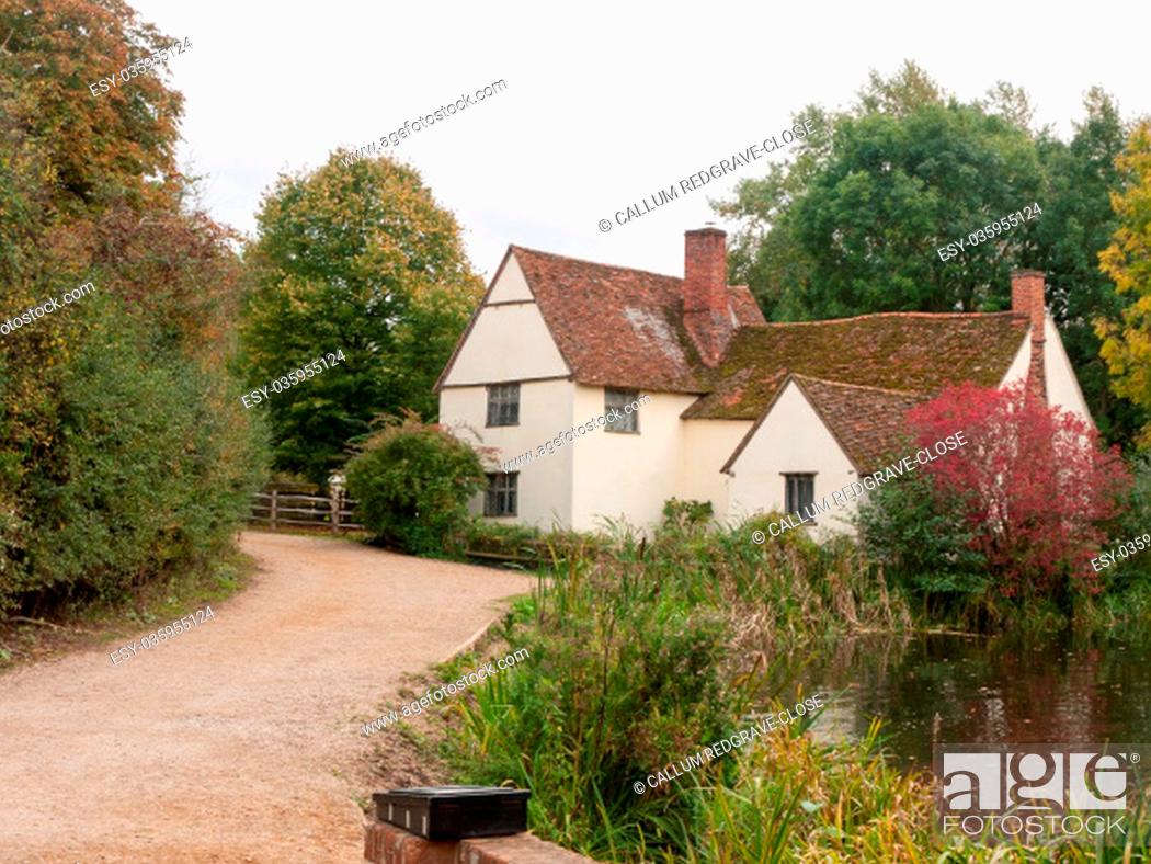 Stock Photo: willy lotts cottage in flatford mill during the autumn no people; Suffolk; England; UK.