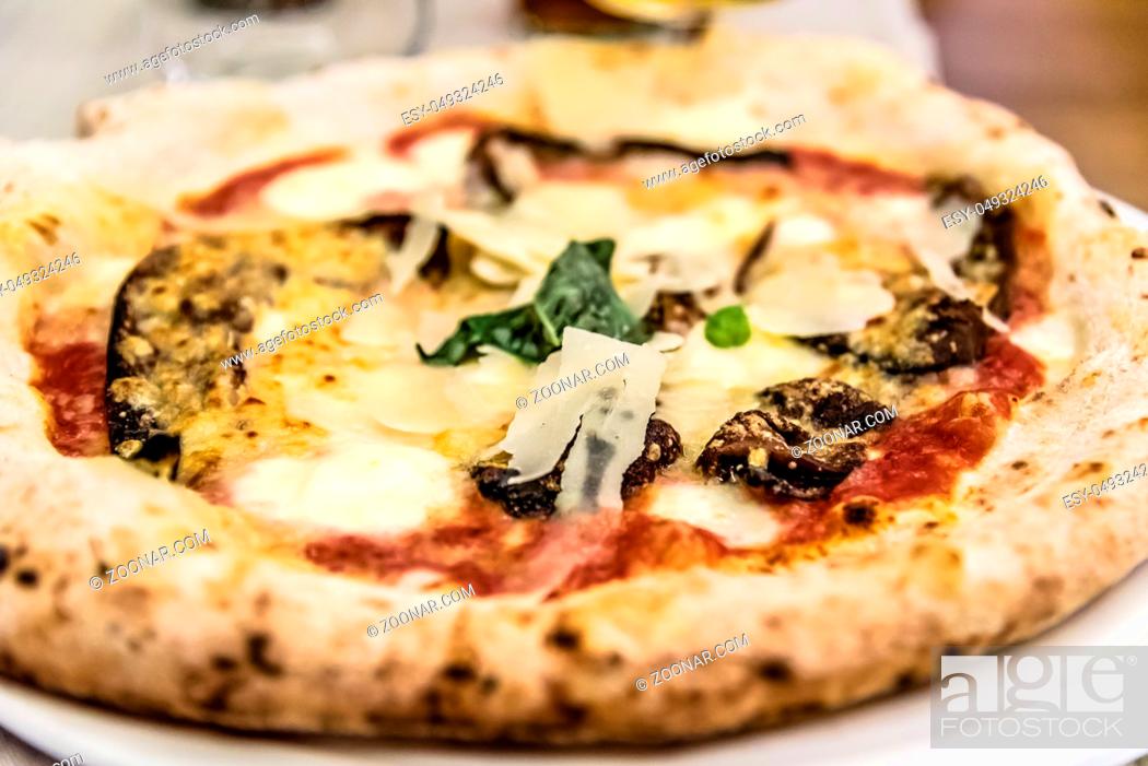 Photo de stock: Vegetables pizza in restaurant. Close up shot with narrow depth of field.