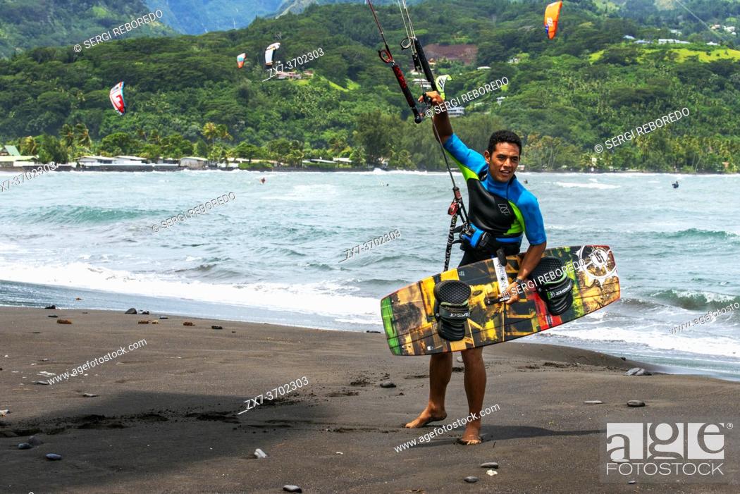 Stock Photo: Kitesurfers in Tahara belvedere, Tahiti Nui, Society Islands, French Polynesia, South Pacific. View of Lafayette black sand beach from Point de View du Tahara'a.