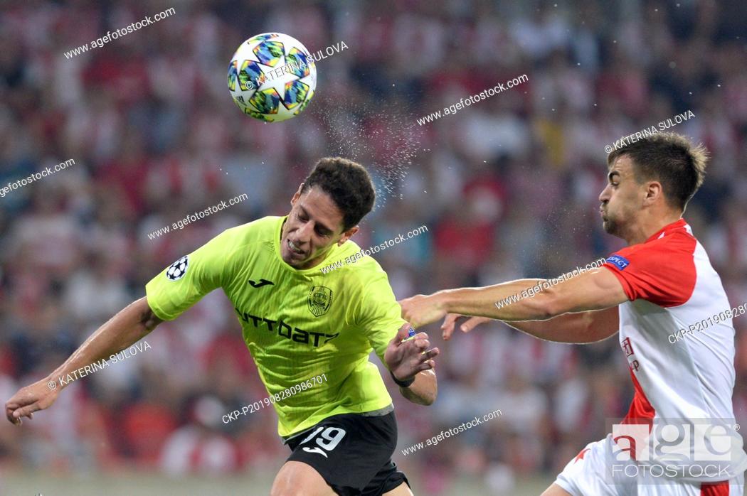 Stock Photo: From left MARIO RONDON of CFR and DAVID HOVORKA of Slavia in action during the Football Champions' League 4th qualifying round return match: Slavia Prague vs.