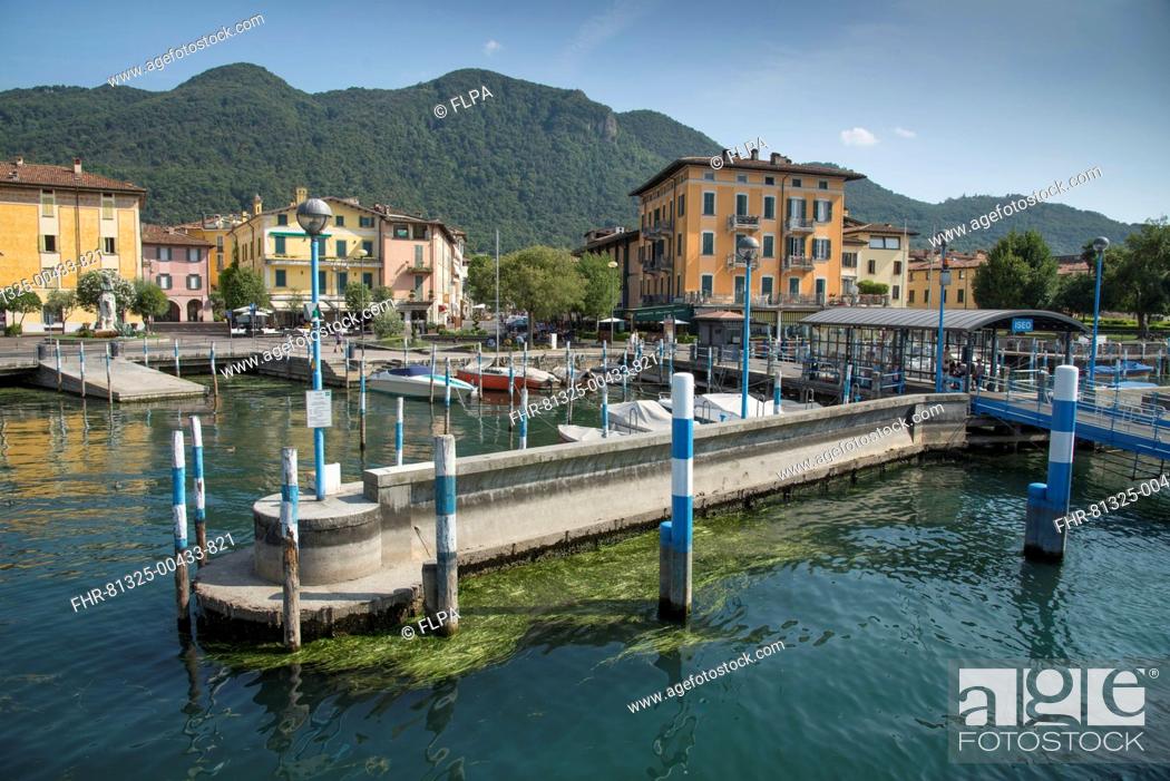 Stock Photo: Boat moorings at town on shore of lake, Iseo, Lago d'Iseo, Val Camonica, Central Alps, Brescia, Lombardy, Italy, July.