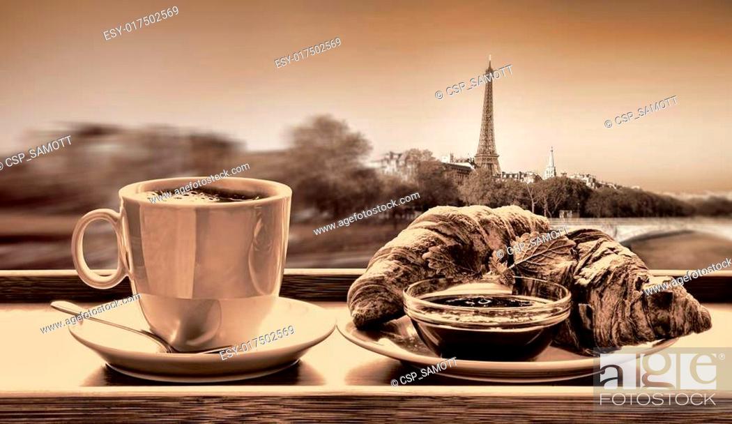 Stock Photo: Coffee with croissants against Eiffel Tower in Paris, France.