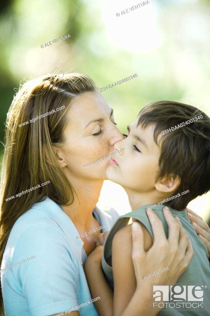 Woman kiss boy