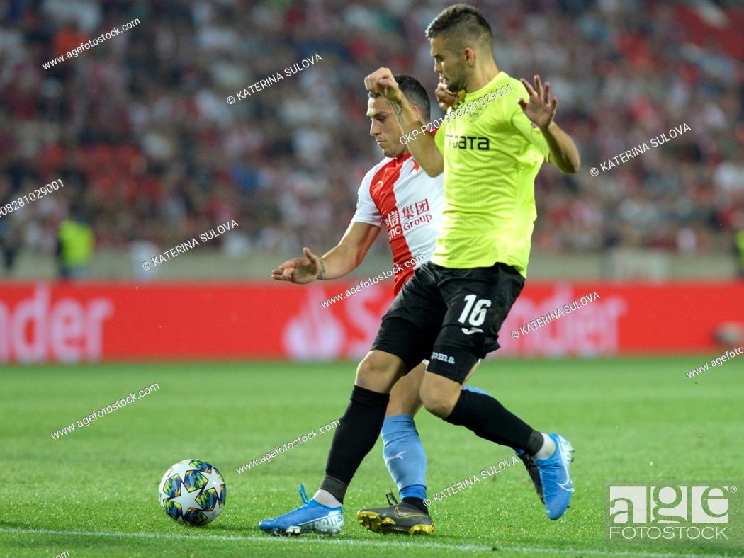 Stock Photo: From left NICOLAE STANCIU of Slavia and MATEO SUSIC of CFR Cluj - Napoca in action during the Football Champions' League 4th qualifying round return match:.