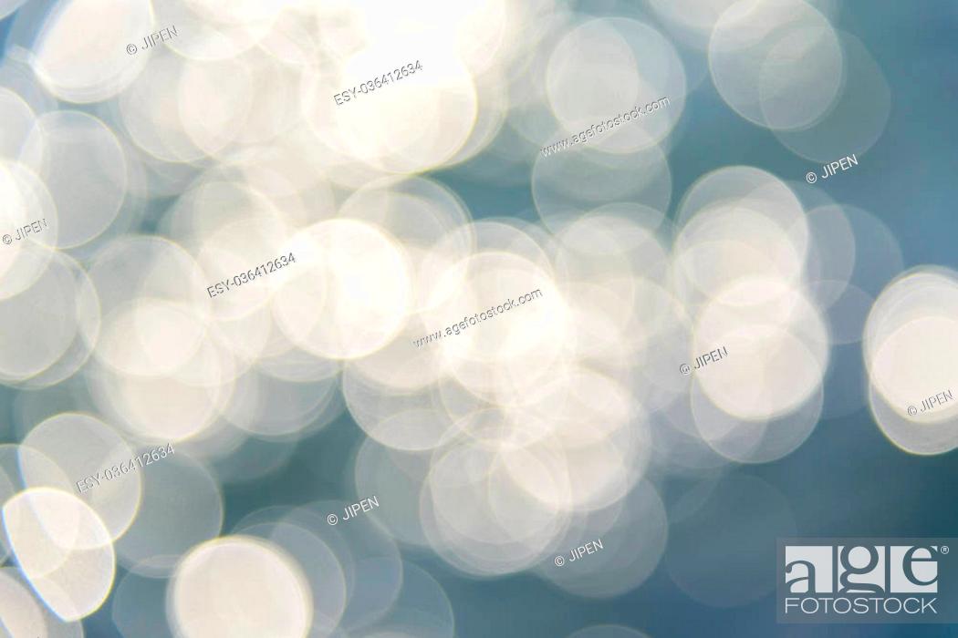 Stock Photo: Background with soft delicate light circles made from water glow.