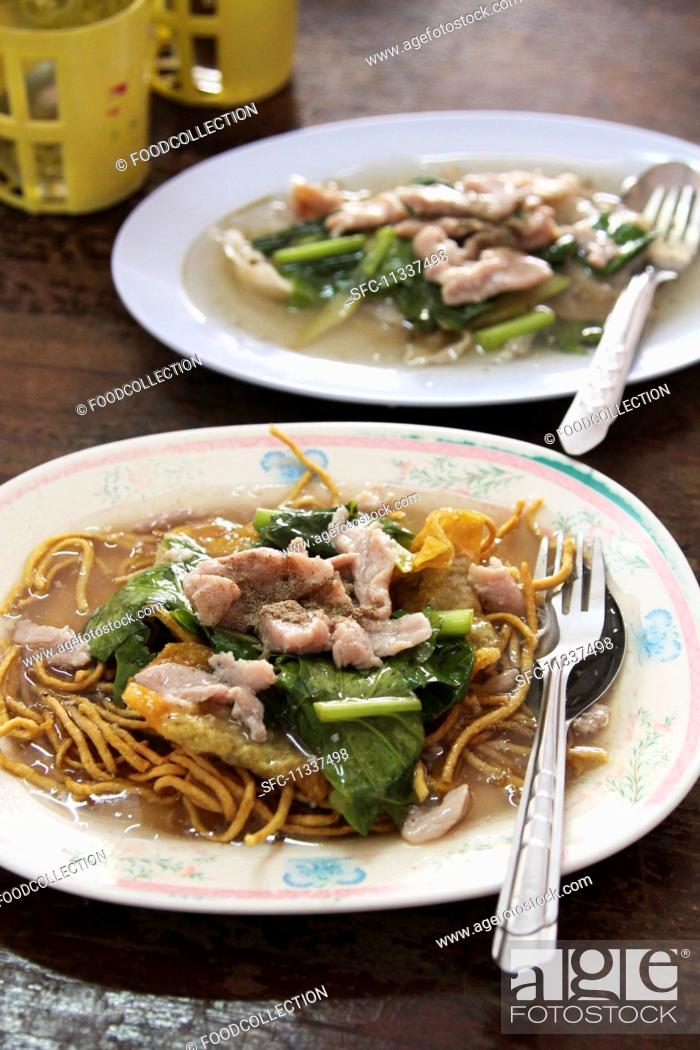Stock Photo: Fried noodles with pork.